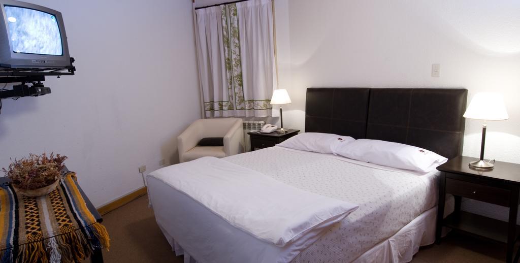 Hotel Y Cabanas Del Nevado Кавиауэ Номер фото